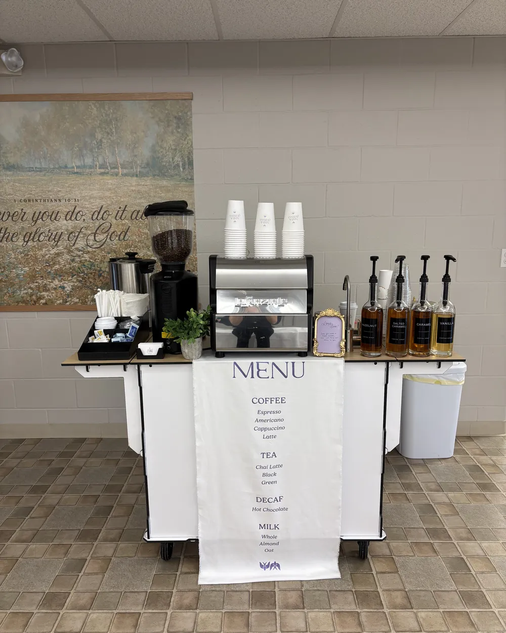 Custom Zerno menu banner displayed on the coffee cart at an event.