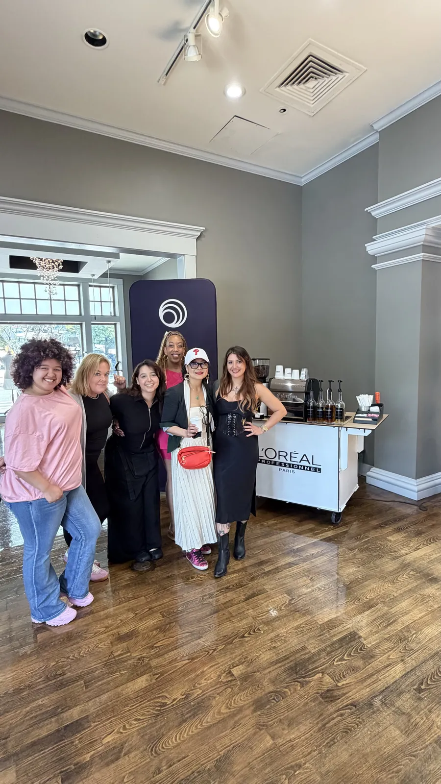 Guests enjoying coffee around the Zerno cart at an indoor event