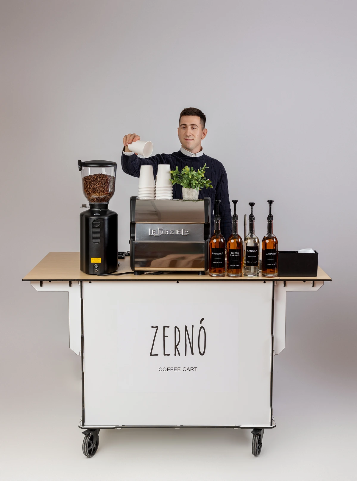 Zerno founder with the original coffee cart